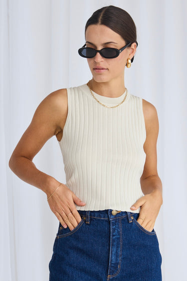 model wears a beige rib knit top