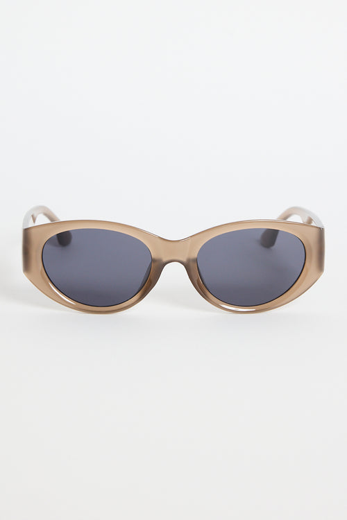 Espresso-brown cat-eye sunglasses with dark tinted lenses, photographed on a white background