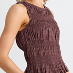 model wears a brown shirred tank top