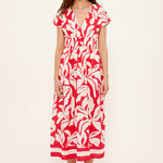 Woman wearing a red white floral dress