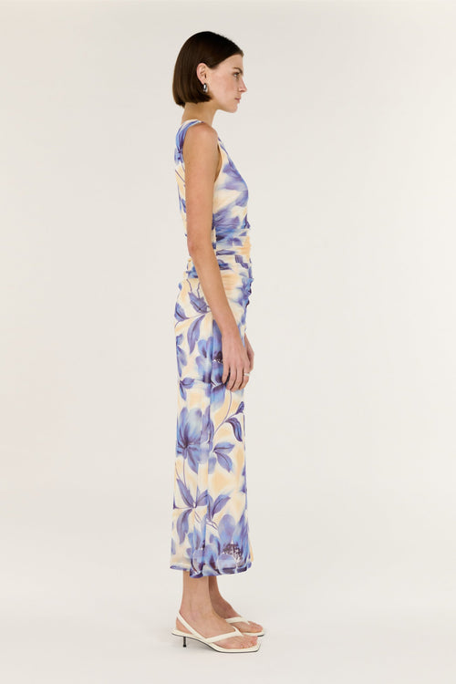 Woman wearing a floral dress on a white background