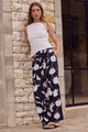 Beneficial Black and White Floral Flat Front Elastic Back Pants