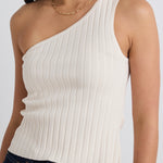 model wears a beige one shoulder top