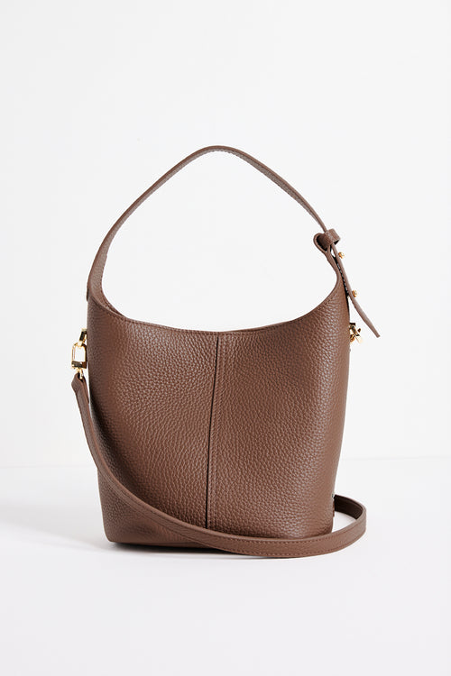 Valencia Brown Leather Multi Strap Mini Tote Bag in a structured bucket silhouette featuring pebbled brown leather, an adjustable shoulder strap and gold hardware, photographed against a clean white background