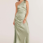 model wears green satin midi dress