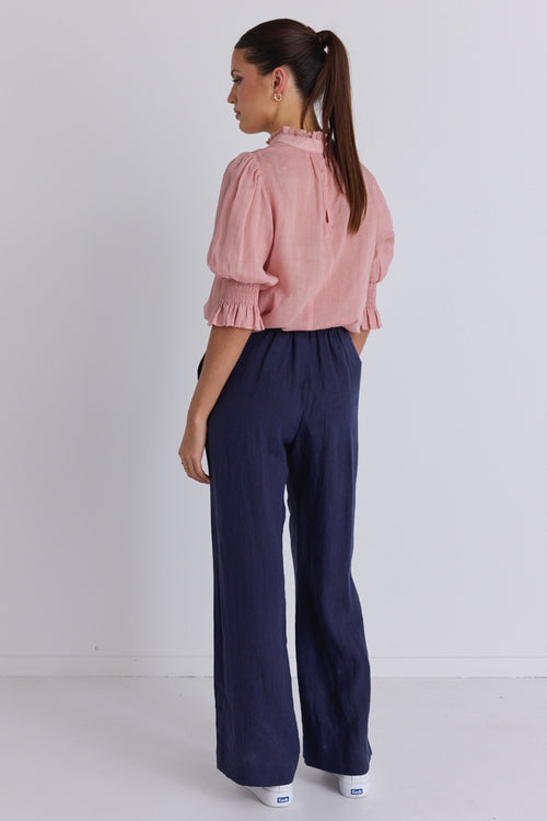 model wears a blue linen pant