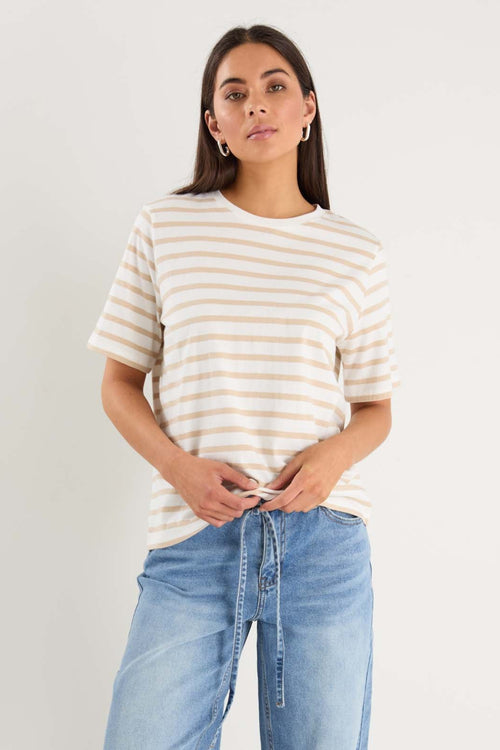 model wearing white striped tee