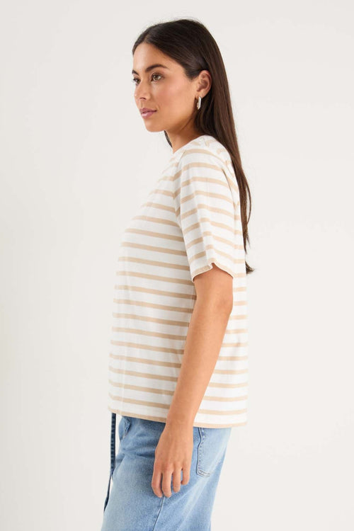 model wearing white striped tee