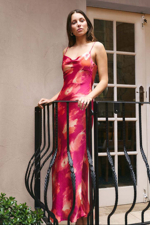 model wearing pink print long dress
