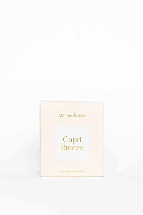 Product packaging for 'Capri Breeze' by 'Willows & Mae' on a light beige background