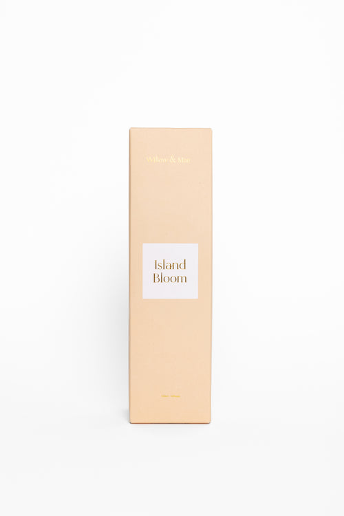 Beige box with 'Island Bloom' label on a white background
