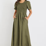 model wears a khaki linen midi dress