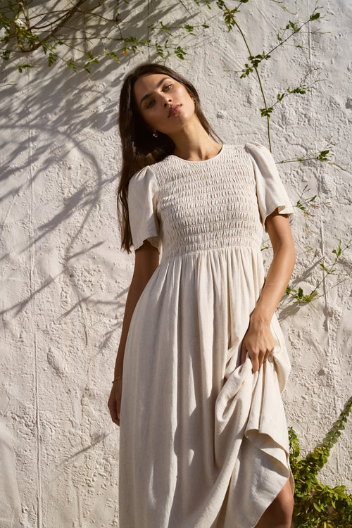 Model wearing natural dress