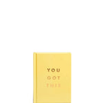 Yellow notebook with 'YOU GOT THIS' text on a white background