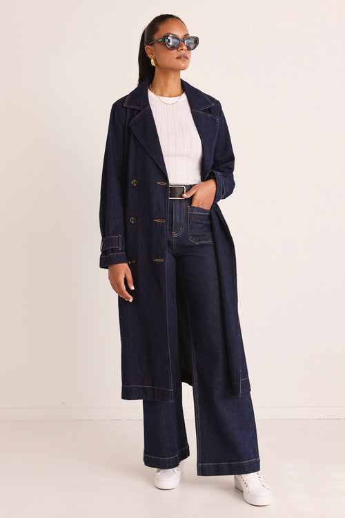 model wears a Blue Denim Trench Coat