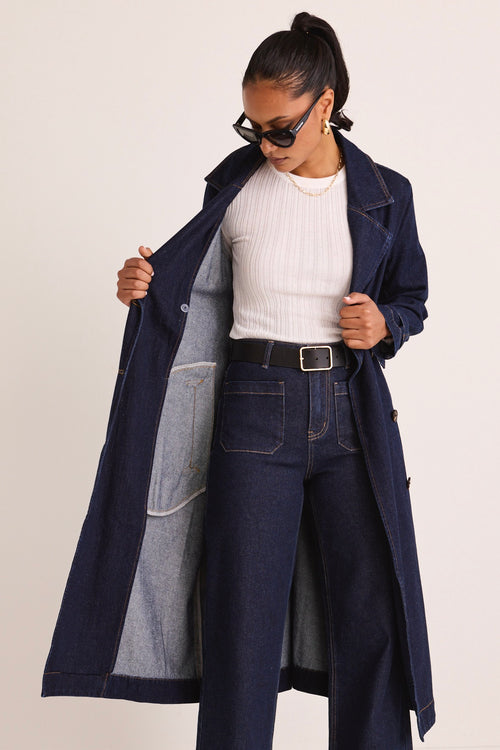 model wears a Blue Denim Trench Coat