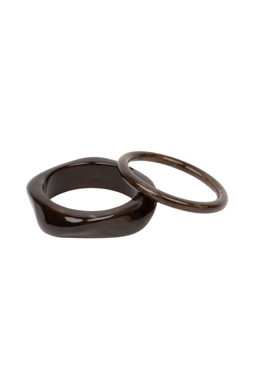 The Set of 2 Brown Resin Bangles in rich brown resin.