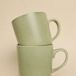 green coffee mug