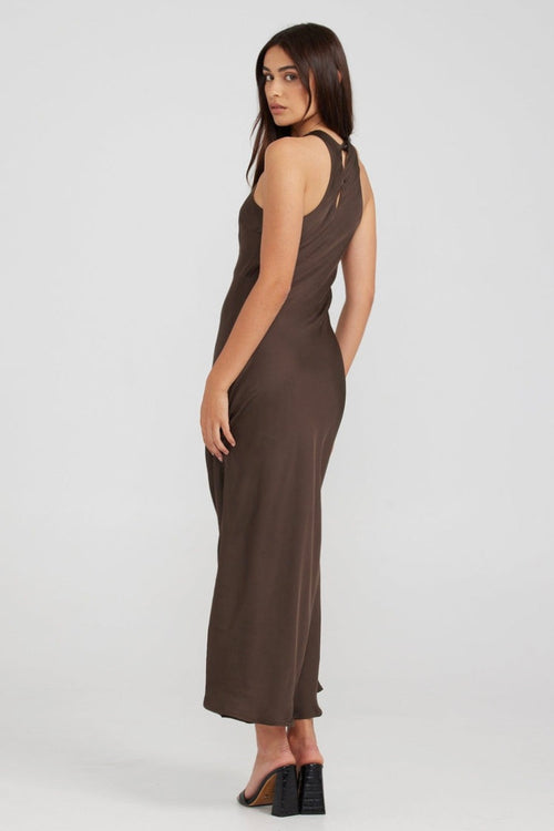 model wears a brown maxi dress