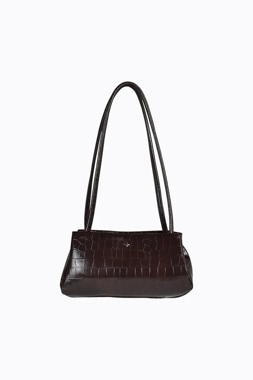 Brown handbag with a crocodile pattern on a white background