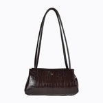 Brown handbag with a crocodile pattern on a white background