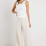 model wears a beige linen pant