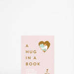 Front cover of book titled " A Hug In A Book: Everyday self care and comforting rituals 