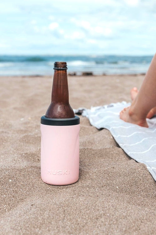 pink beer cooler at the beach