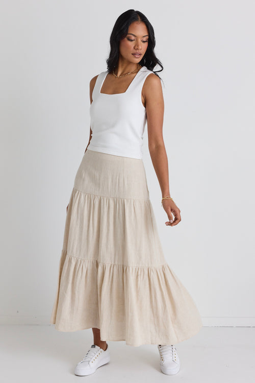 model wears a beige linen skirt