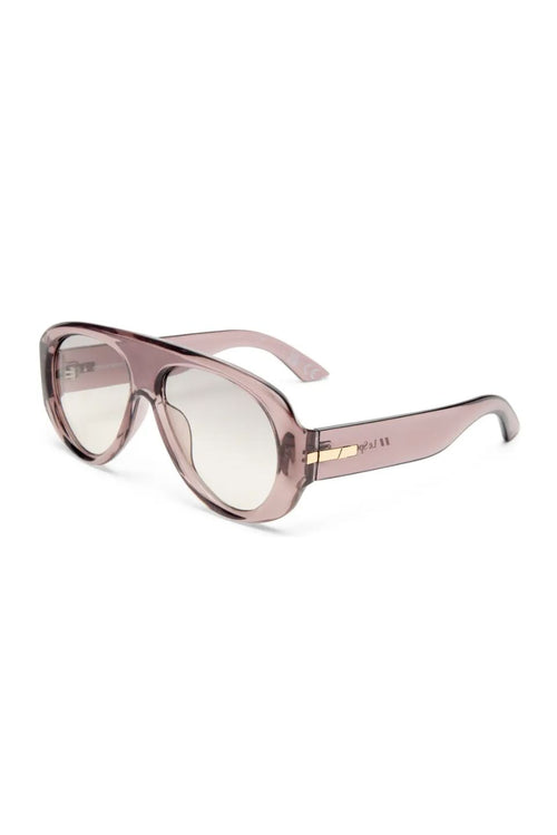 Le Specs oversized aviator-style sunglasses with translucent dusty rose frames and gradient lenses, shown on a clean white background.