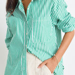 model wears a green stripe shirt