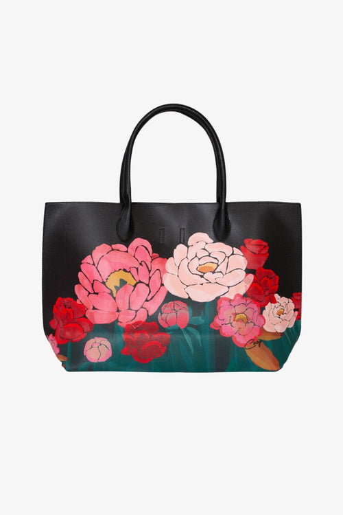 pink and red roses printed onto a black leather tote bag